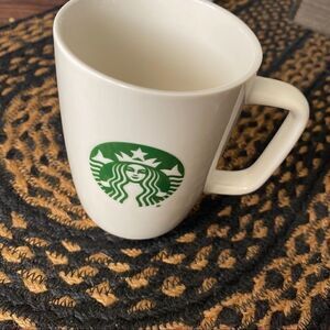 White with green Starbucks mug logo
